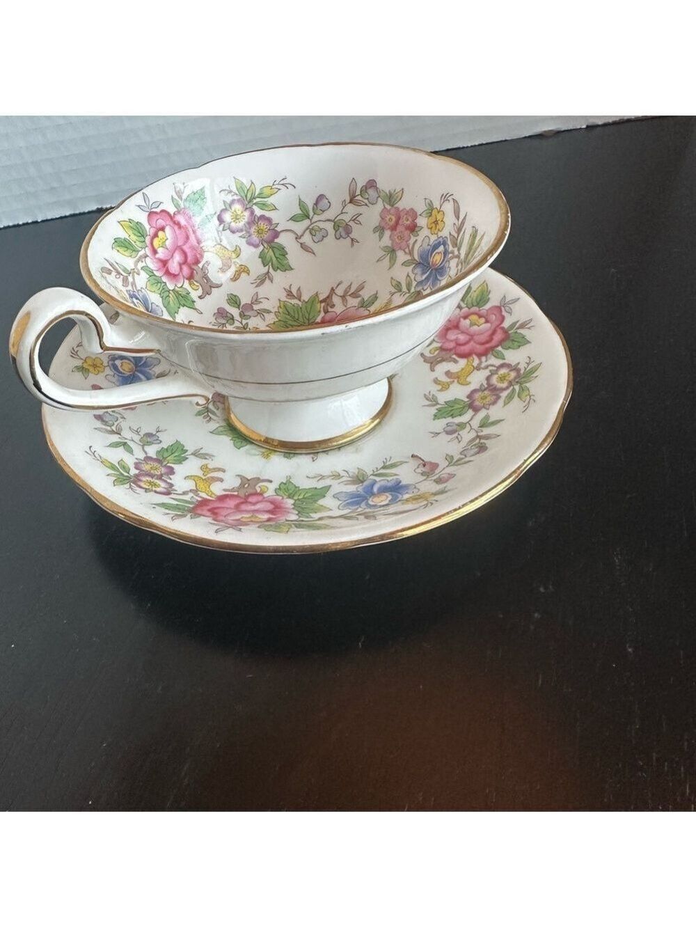 Royal Stafford bone china teacup and saucer set in the Rochester pattern.